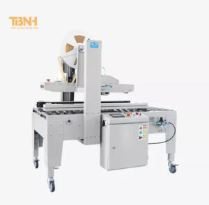 Máy dán thùng carton là gì? Ưu điểm của máy dán băng keo